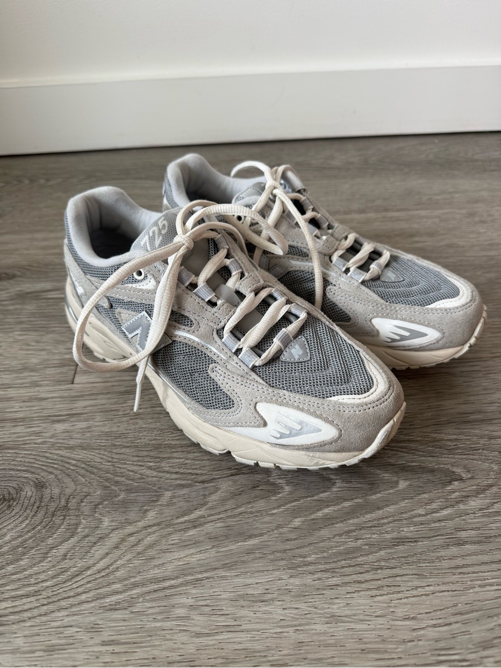 New Balance light gray and cream sneakers
